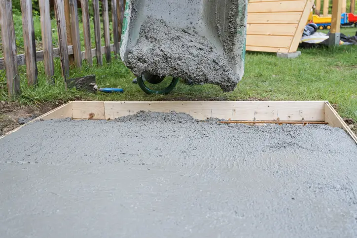 Concrete being poured for strong reinforced base