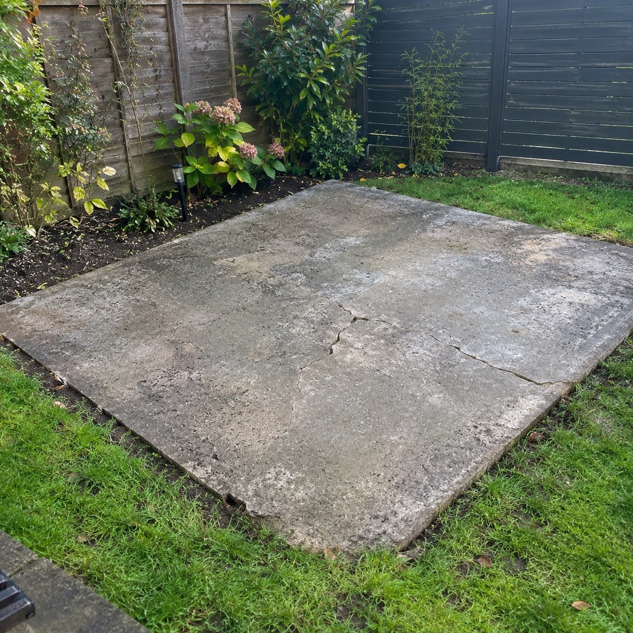 Cracked and failed concrete base in Enfield