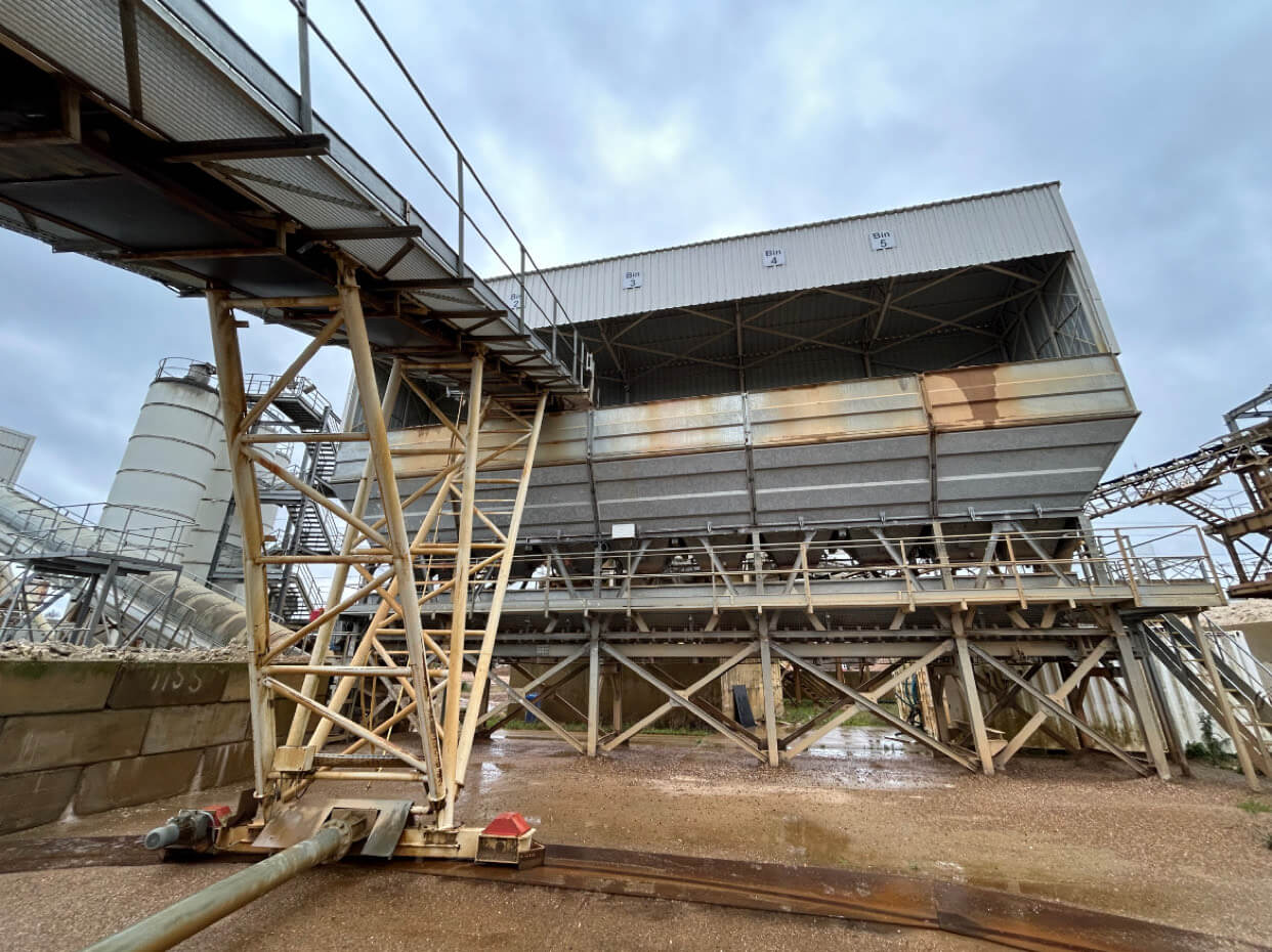 Conveyor system feeding concrete mixer bay at local Enfield batching plant