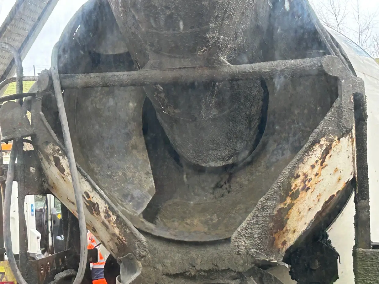 Concrete being loaded into a volumetric lorry at a local Enfield batching plant